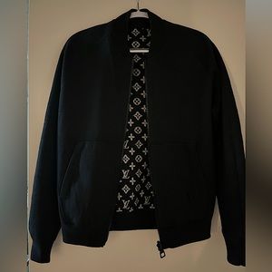 I am selling a Louis Vuitton men’s reversible monogram black track top